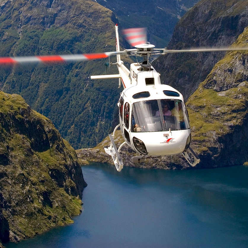 Indulgent Escape: New Zealand Luxury Vacation - Helicopter Over Milford Sound