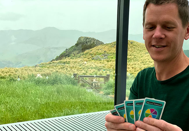 Playing Cards While the Local Sheep Look On